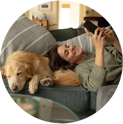 Woman on sofa with dog
